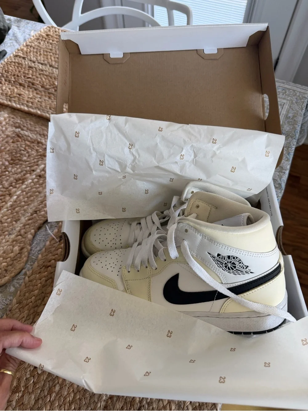 Jordan 1 Mid Coconut Milk with Black Swoosh